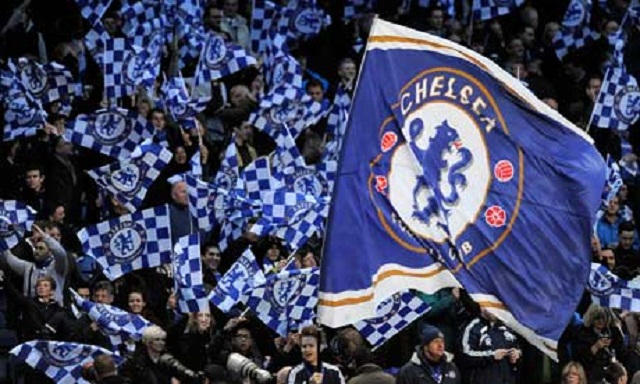 Chelsea fans wave flags ahead of the UEF