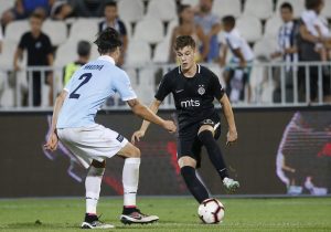 CRNO-BELI ĐACI: Mladi fudbaleri Partizana poželeli đacima srećan povratak u klupe (VIDEO)